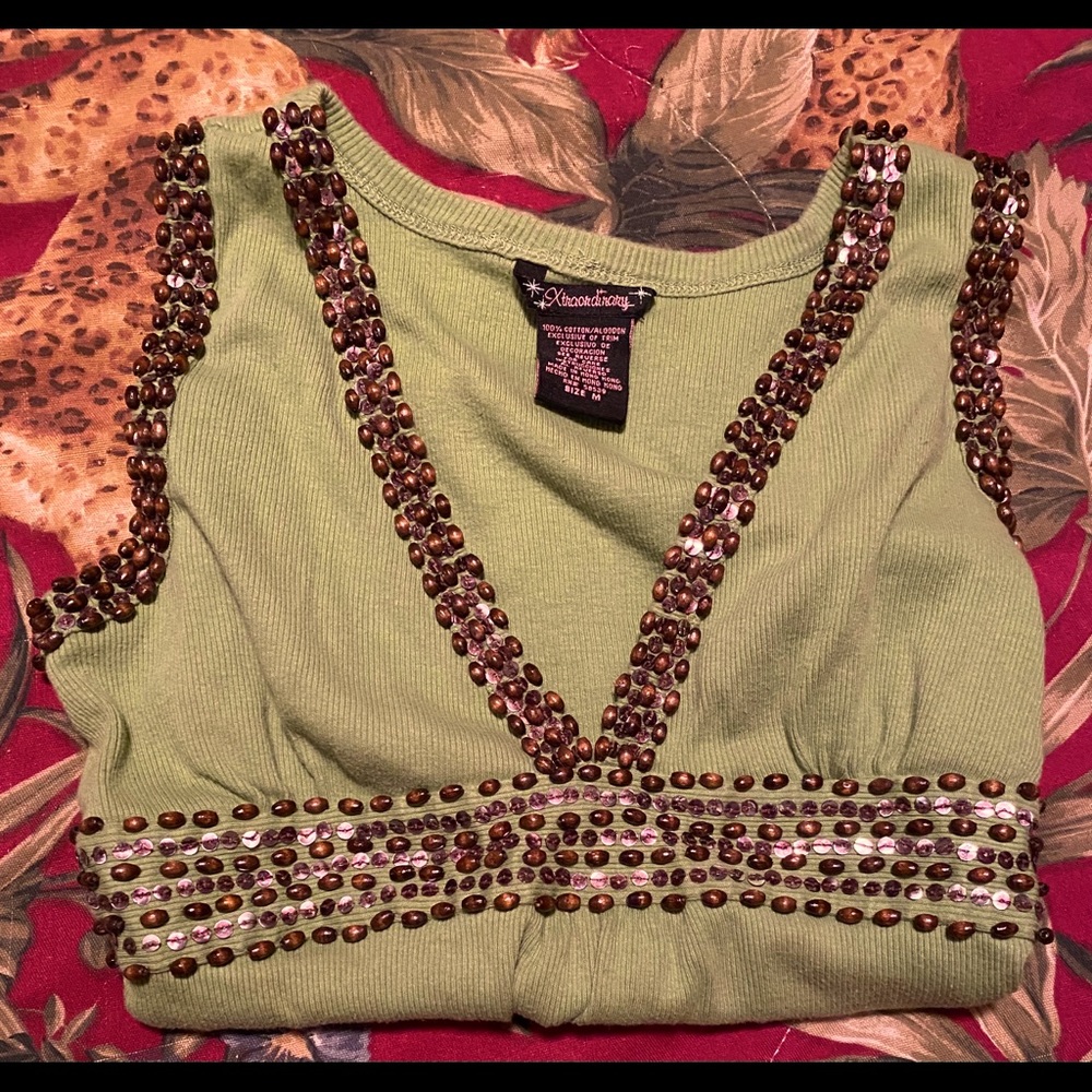 Green with brown beads.